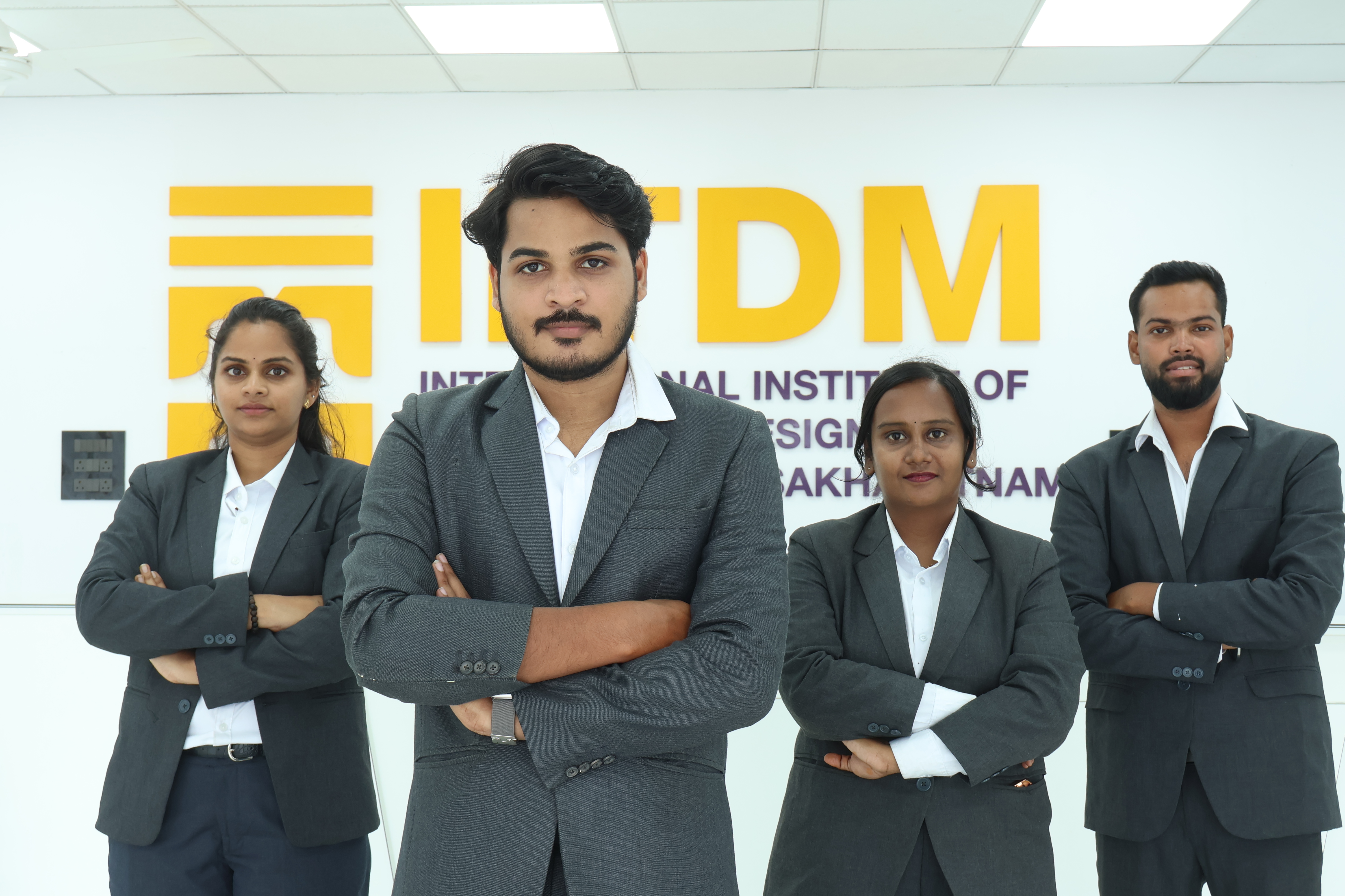 Graduate holding diploma at IITDM Vizag.